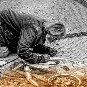 Man painting on the street 0 using images in content