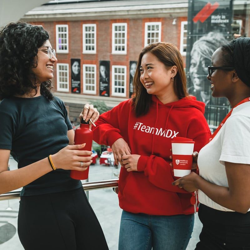 Middlesex University creative chatbot case study image showing students chatting on university campus