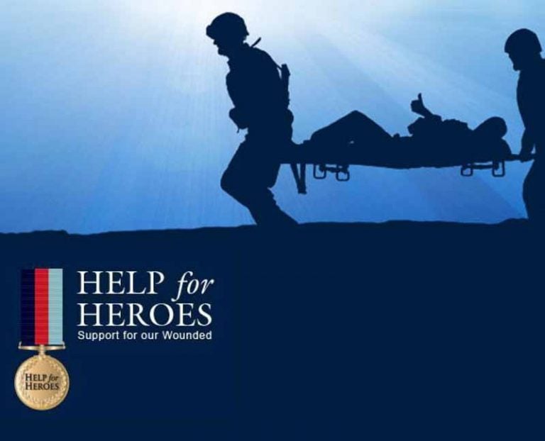 Help for Heroes image of two soldiers carrying a wounded soldier